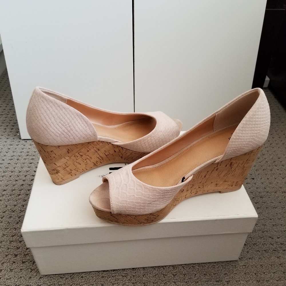 Blush peep toe wedge pumps